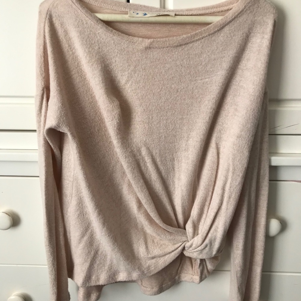 Sweater with tie knot bottom